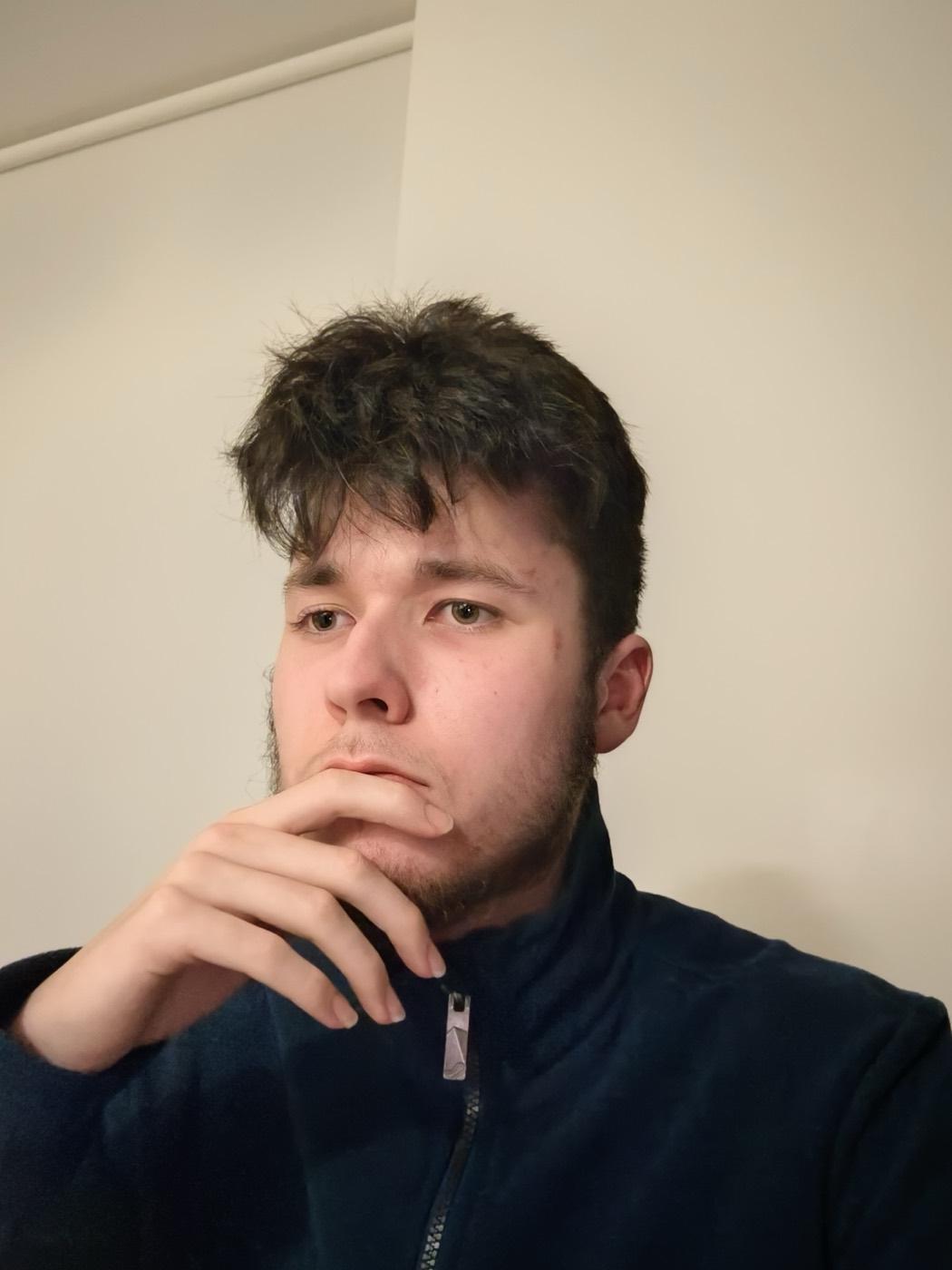 Reuben, hand on chin